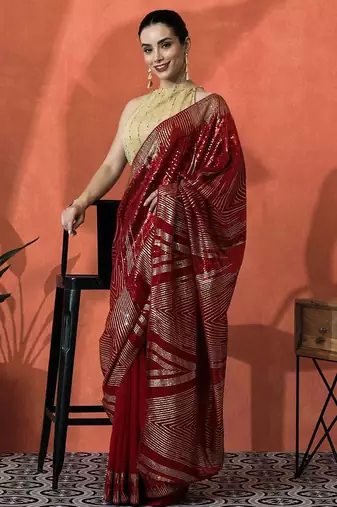 Red embellished embroidered saree with unstitched blouse