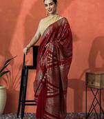 Red embellished embroidered saree with unstitched blouse