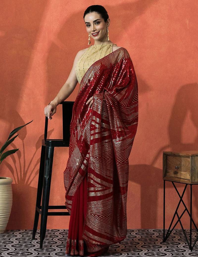 Red embellished embroidered saree with unstitched blouse