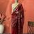 Red embellished embroidered saree with unstitched blouse