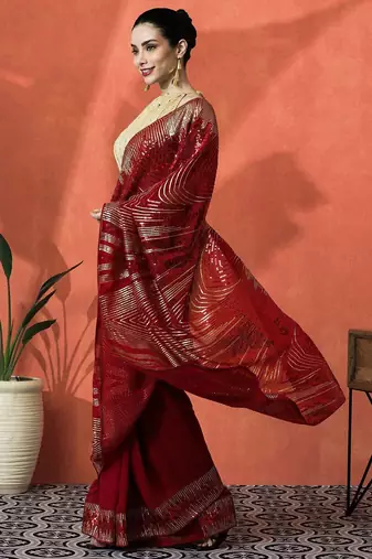Red embellished embroidered saree with unstitched blouse