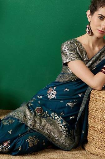 Teal ethnic motif zari woven tassel detail kanjeevaram saree with blouse