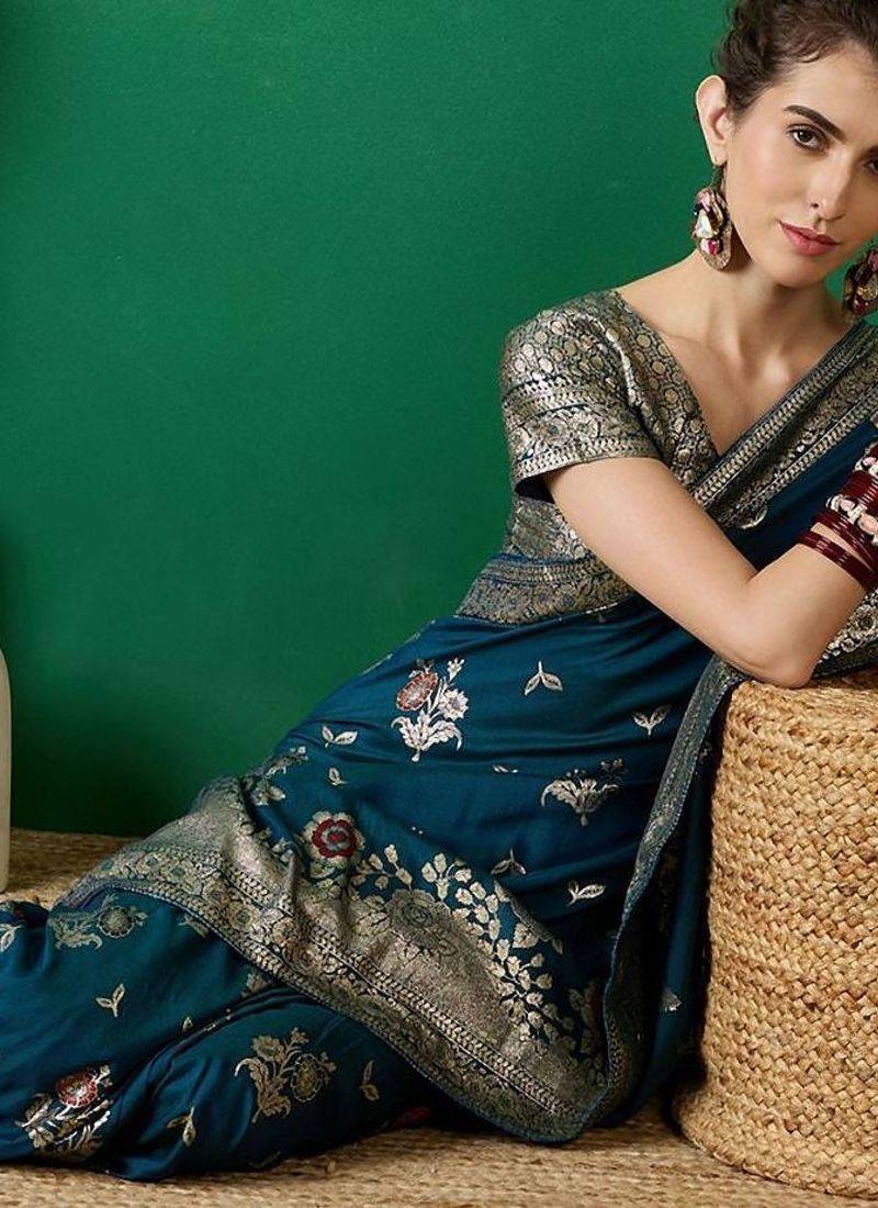 Teal ethnic motif zari woven tassel detail kanjeevaram saree with blouse