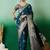 Teal ethnic motif zari woven tassel detail kanjeevaram saree with blouse