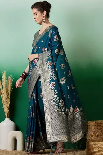 Teal ethnic motif zari woven tassel detail kanjeevaram saree with blouse
