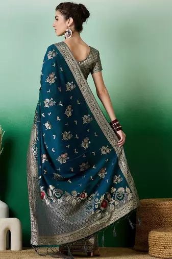 Teal ethnic motif zari woven tassel detail kanjeevaram saree with blouse