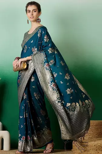 Teal ethnic motif zari woven tassel detail kanjeevaram saree with blouse
