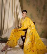 Yellow ethnic motif zari woven tassel detail kanjeevaram saree