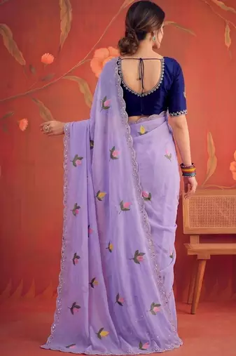 Lavender floral mirror work poly georgette saree