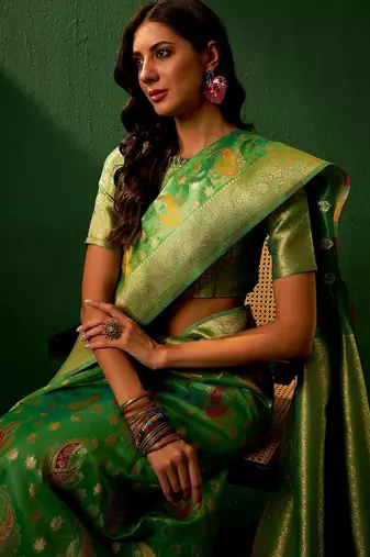 Green ethnic motifs woven designed kanjeevaram saree
