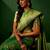 Green ethnic motifs woven designed kanjeevaram saree