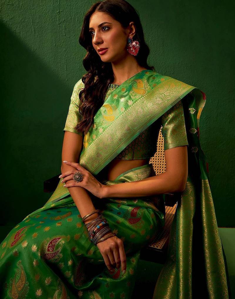 Green ethnic motifs woven designed kanjeevaram saree