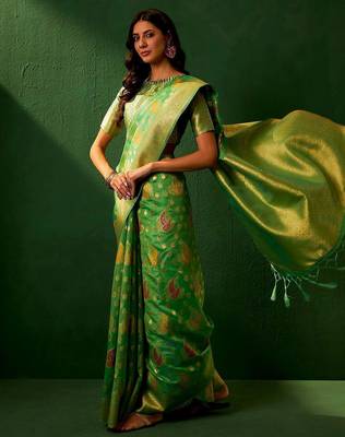Green ethnic motifs woven designed kanjeevaram saree 3