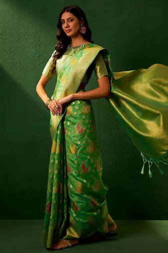 Green ethnic motifs woven designed kanjeevaram saree