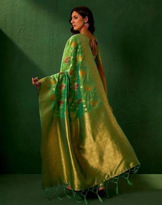 Green ethnic motifs woven designed kanjeevaram saree 5