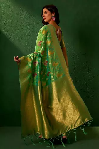 Green ethnic motifs woven designed kanjeevaram saree