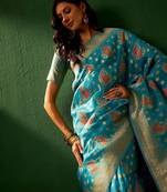 Teal eyhnic motifs woven designed kanjeevaram saree