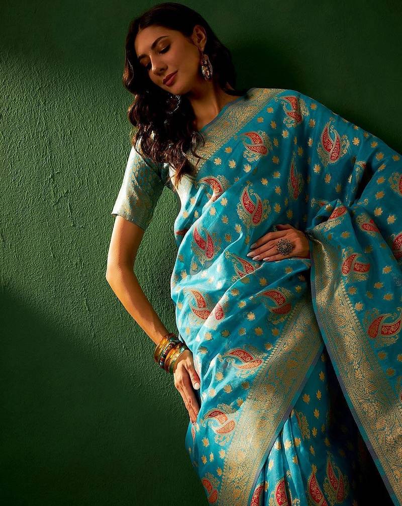 Teal eyhnic motifs woven designed kanjeevaram saree