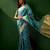Teal eyhnic motifs woven designed kanjeevaram saree