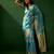 Teal eyhnic motifs woven designed kanjeevaram saree