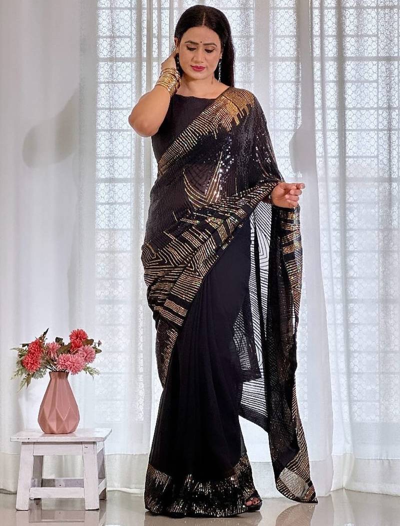 Black embellished party wear saree with matching blouse