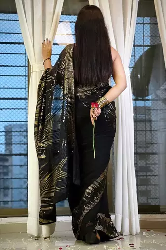 Black embellished party wear saree with matching blouse