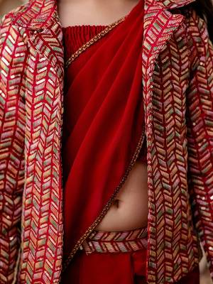 Red girls lehenga saree with jacket 2