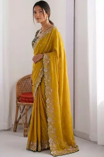 Mustard embellished embroidered sarees with unstitched blouse piece