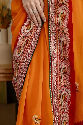 Red bandhani printed saree with unstitched blouse piece