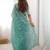 Green tissue silk sequin embroideried blouse piece & sarees