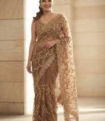 Beige embellished beads & stones satin saree