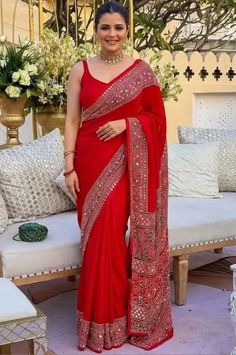 Red ethnic motifs mirror work saree