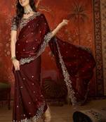 Maroon floral embroidered tissue heavy work saree