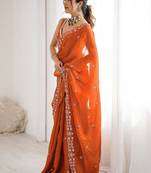 Orange embroidered saree with unstitched blouse piece