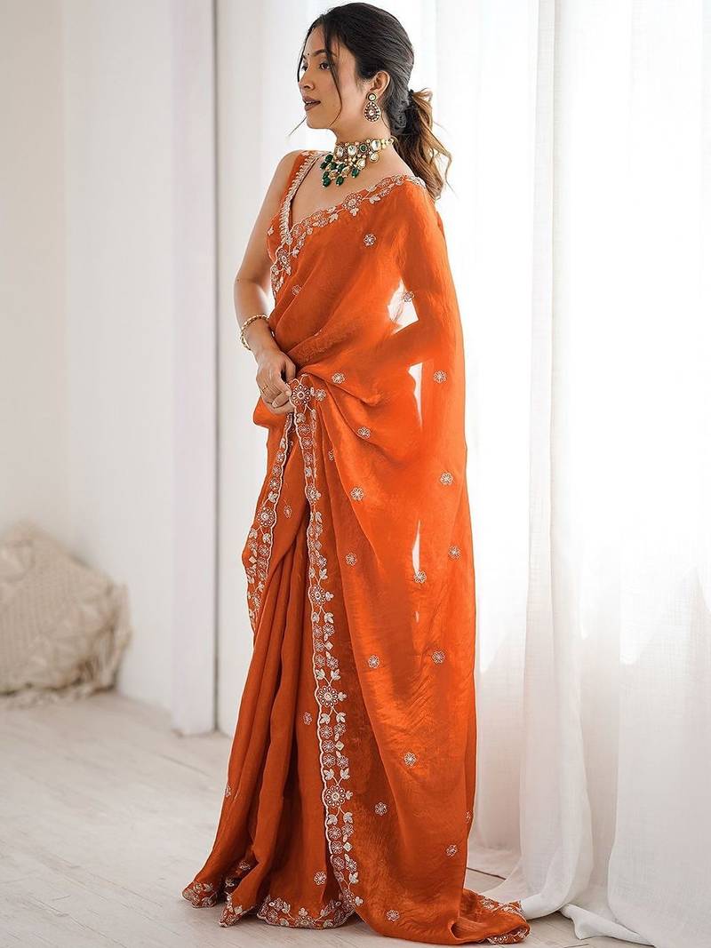 Orange embroidered saree with unstitched blouse piece