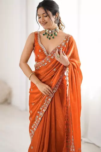 Orange embroidered saree with unstitched blouse piece
