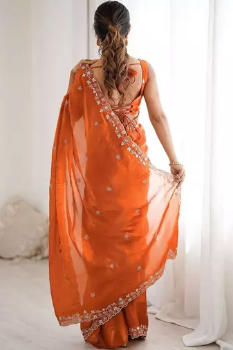 Orange embroidered saree with unstitched blouse piece