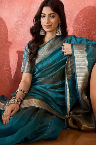 Teal woven design zari organza saree
