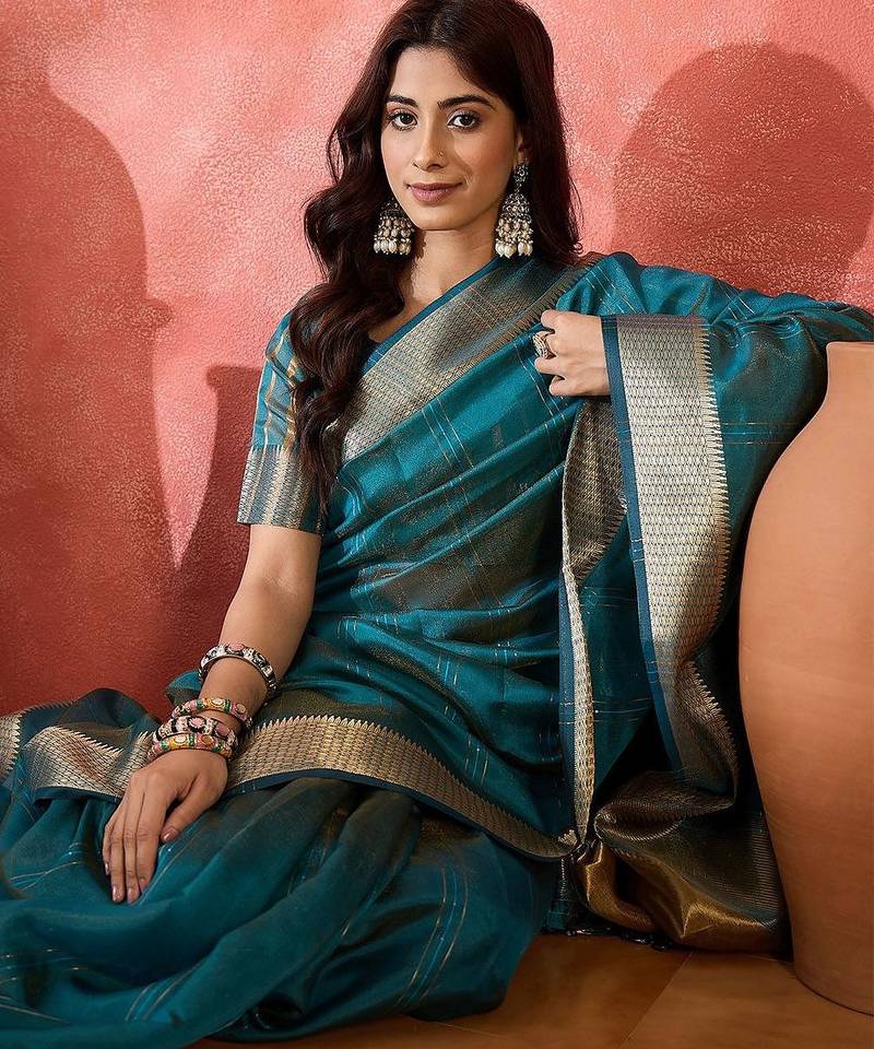 Teal woven design zari organza saree