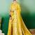 Yellow ethnic motif zari woven tassel detail kanjeevaram saree with blouse