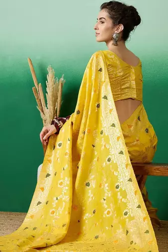 Yellow ethnic motif zari woven tassel detail kanjeevaram saree with blouse