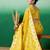 Yellow ethnic motif zari woven tassel detail kanjeevaram saree with blouse