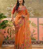 Orange floral sequinned organza heavy work saree