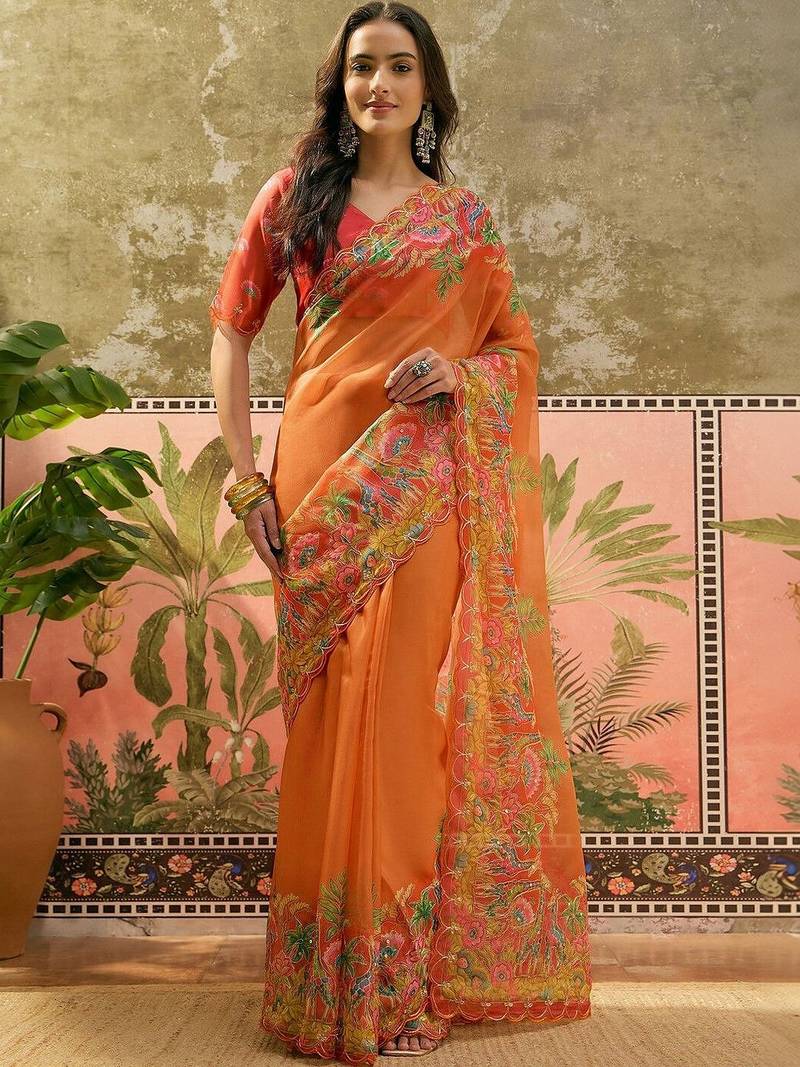 Orange floral sequinned organza heavy work saree