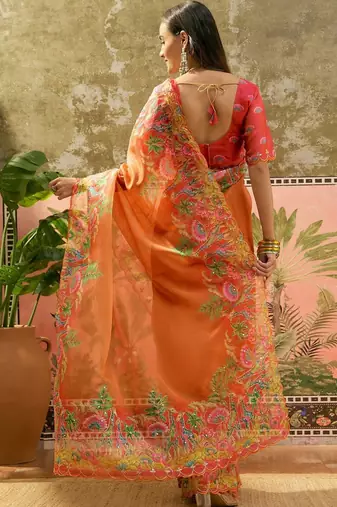 Orange floral sequinned organza heavy work saree