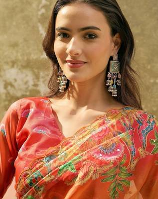 Orange floral sequinned organza heavy work saree 4