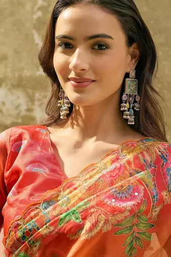 Orange floral sequinned organza heavy work saree