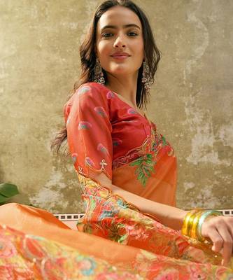 Orange floral sequinned organza heavy work saree 5