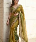 Green embroidered sarees with unstitched blouse piece