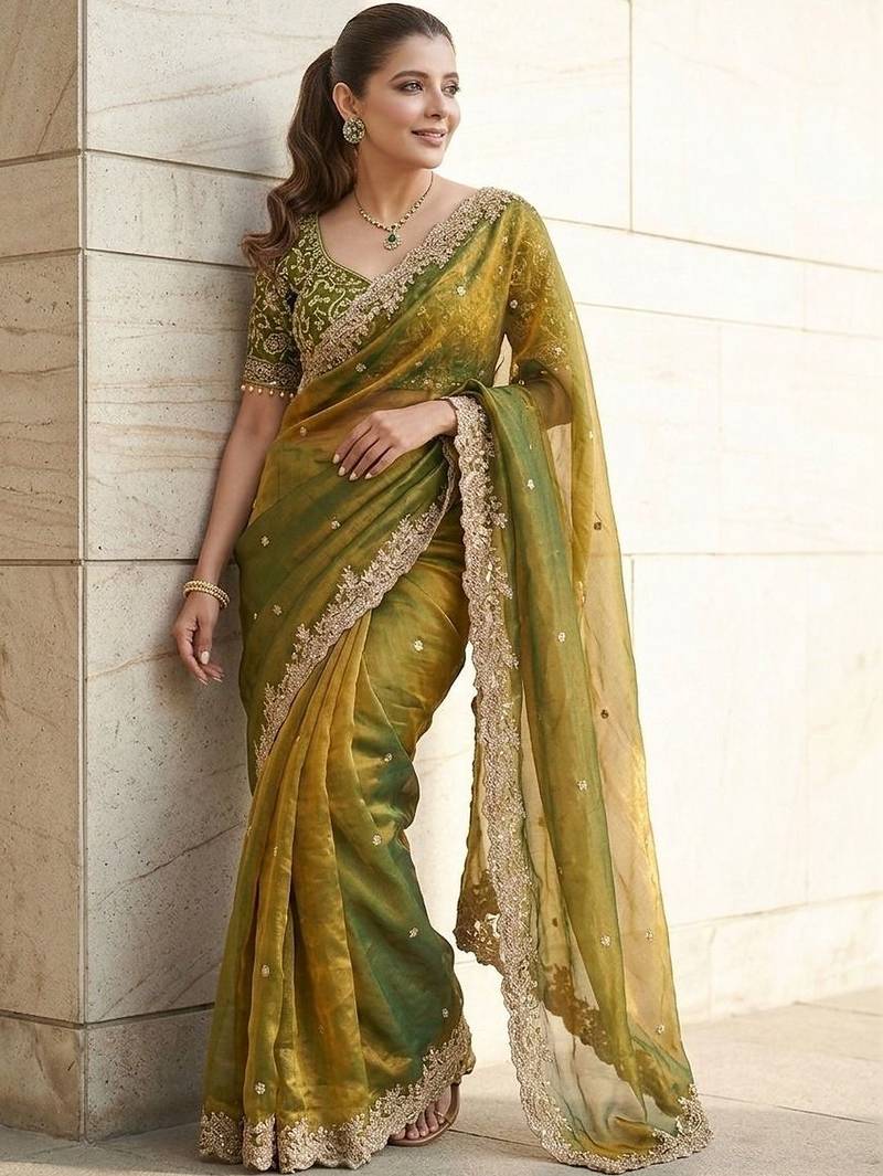 Green embroidered sarees with unstitched blouse piece
